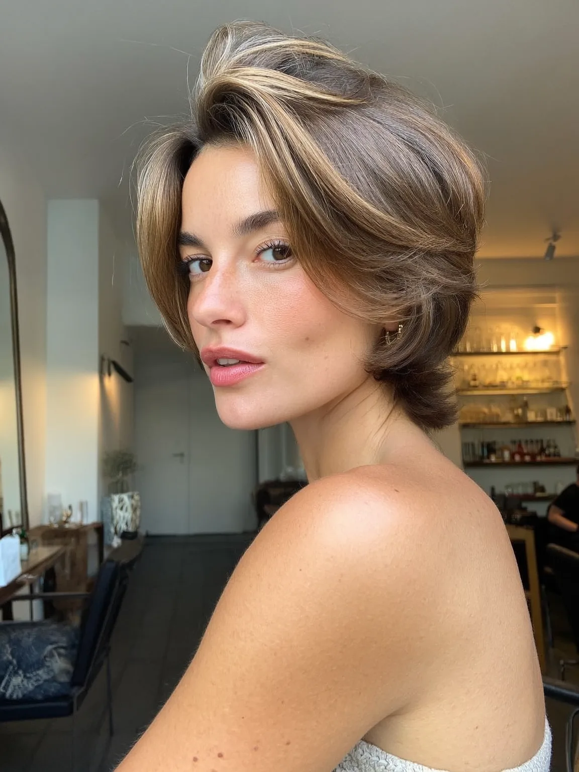 Chin-Length Layered Bob with Honey Blonde Highlights